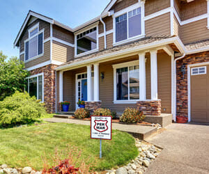 Home with yard sign