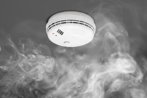 Smoke alarm engulfed in smoke