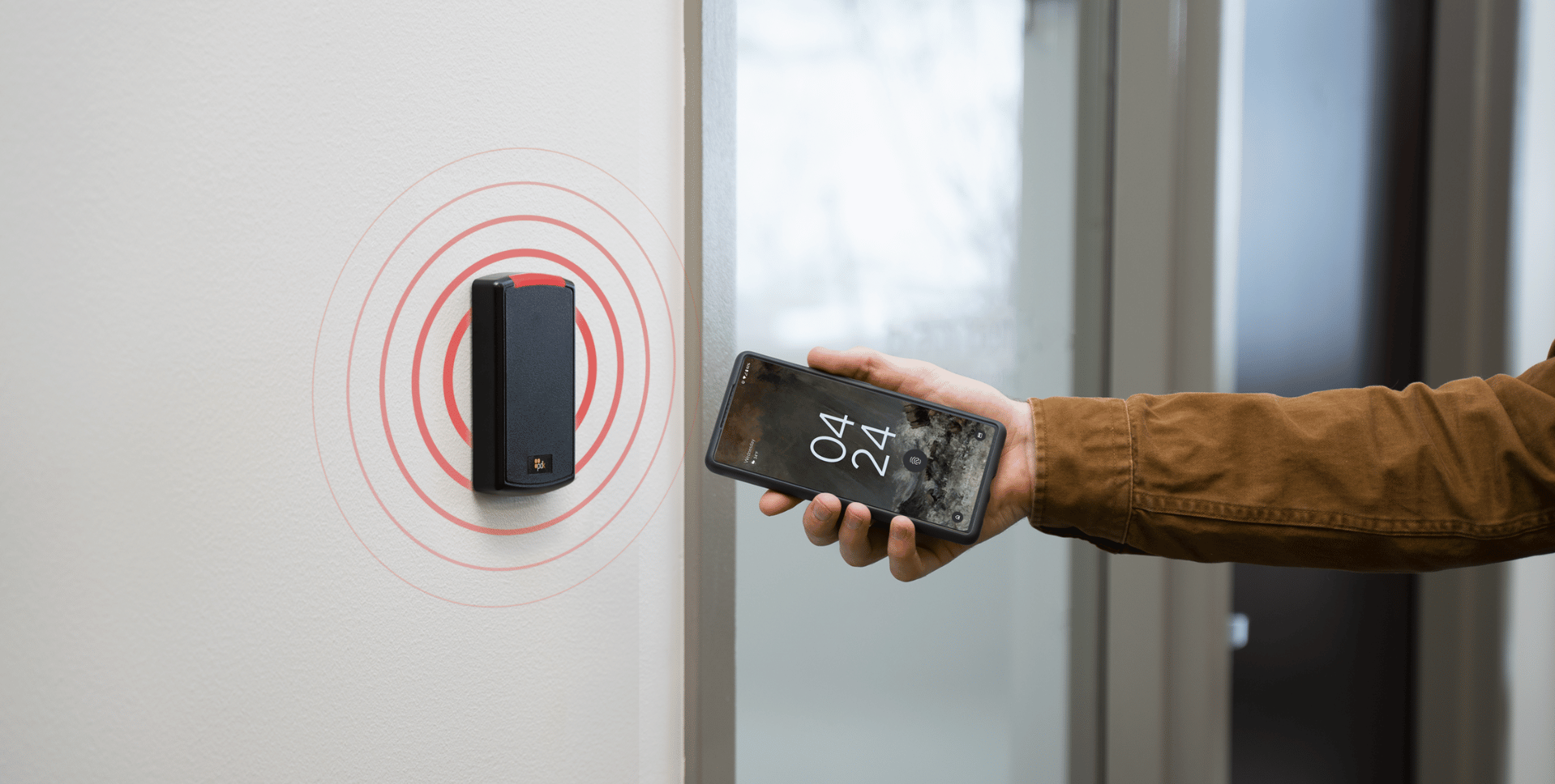Holding phone up to access control card reader