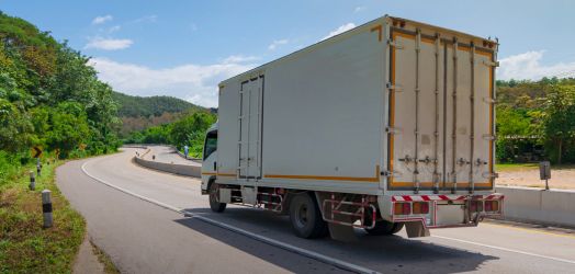 truck driving on road