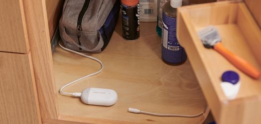Environmental monitoring sensor under cabinet