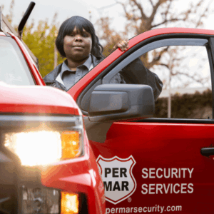 guard standing by Per mar vehicle