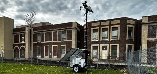 Mobile rental trailer in front of building