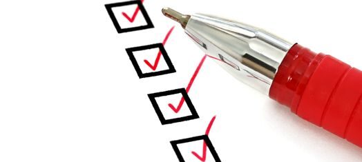 a checklist marked off with pen