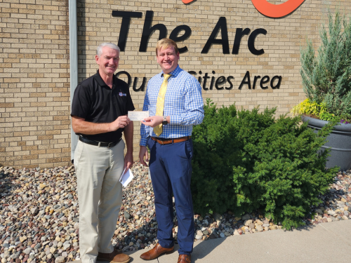 Arc of the Quad Cities receiving check