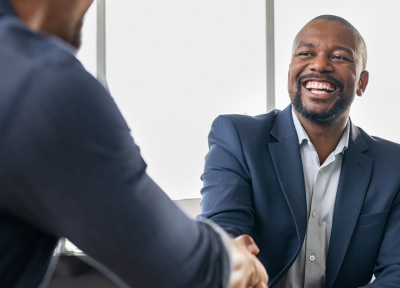two men shaking hands
