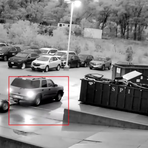 dumpster and car