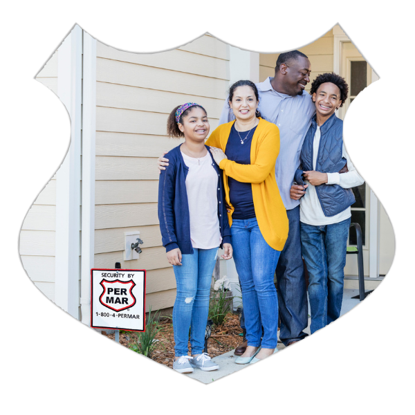 family in front of home