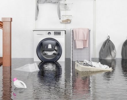 flooding in house near washing machine