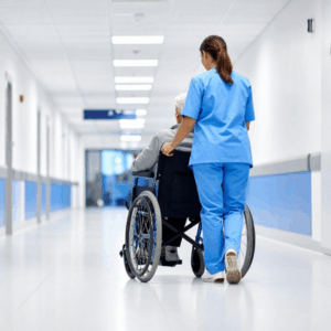 Nurse walking a patient down the hallway