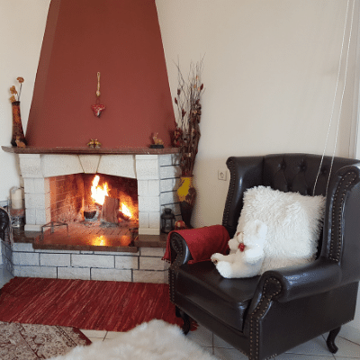 Chair next to fireplace