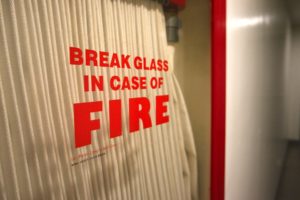 Fire Hose behind glass