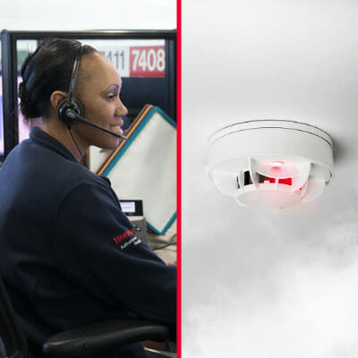 Per Mar Security monitoring agent pictured with a smoke detector
